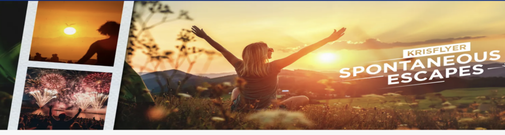 a woman sitting on a hill with her arms raised